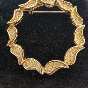 Elegant Gold Tone Brooch